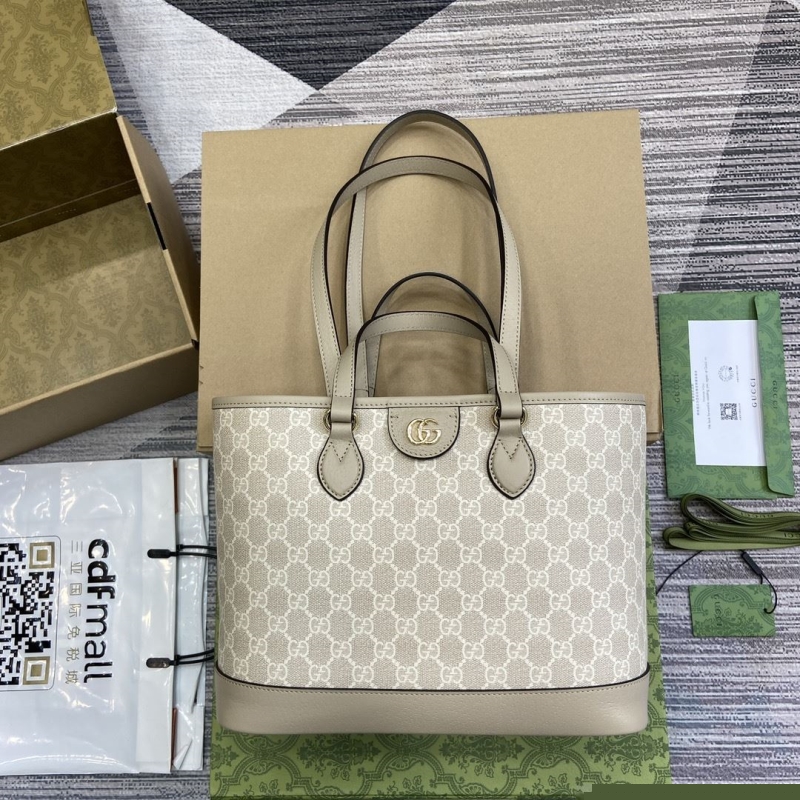 G*u*i shopping bags